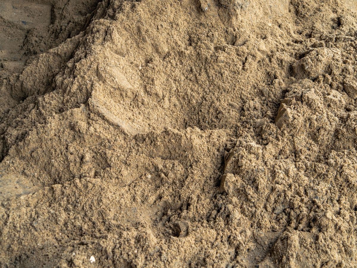 Areia média lavada · m³